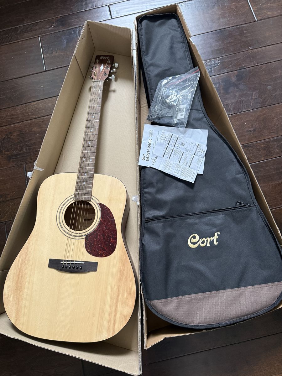 Cort Acoustic Guitar with bag.