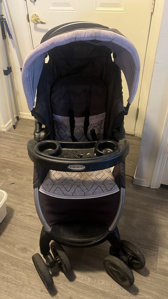 Graco Stroller with Canopy and Child Tray - Black and Grey