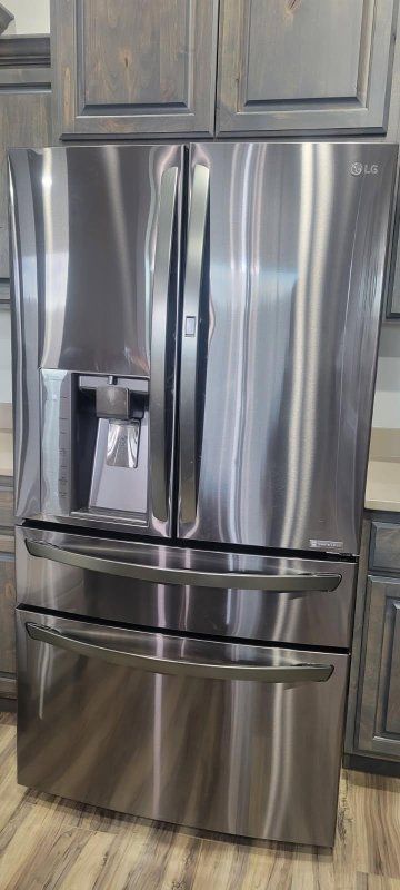 LG double door refrigerator/ freezer.