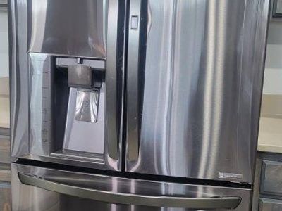 LG double door refrigerator/ freezer.