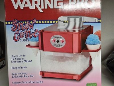 Waring Pro SCM100 Snow Cone Maker - Shaved Ice in Seconds - Includes 4 Reusable & 12 Paper Cones