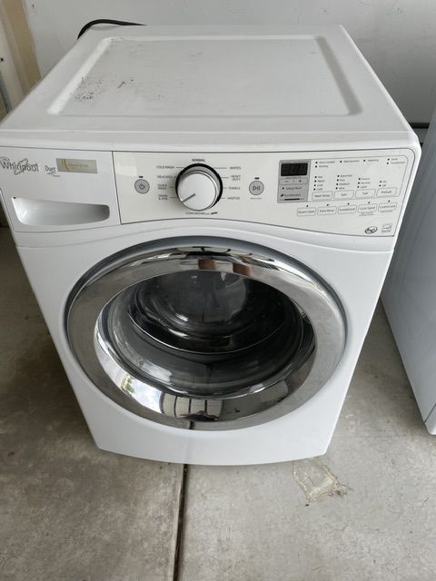 Whirlpool stackable frontload washing machine with storage base.