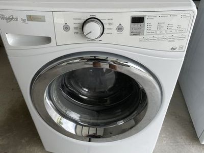 Whirlpool stackable frontload washing machine with storage base.