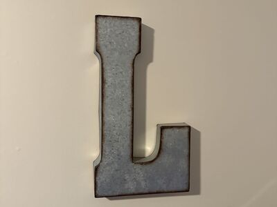 Large metal L decor