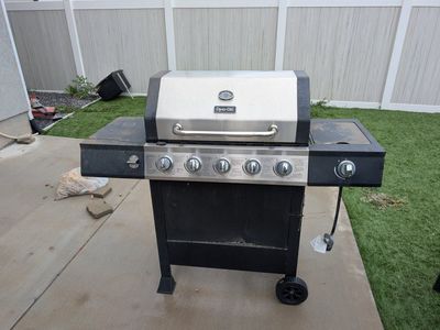 Dyna-Glo 5-Burner Propane Gas Grill with Side Burner and Wheels