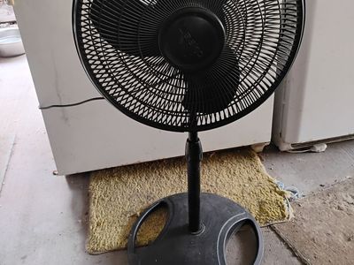 Oscillating fan on stand
