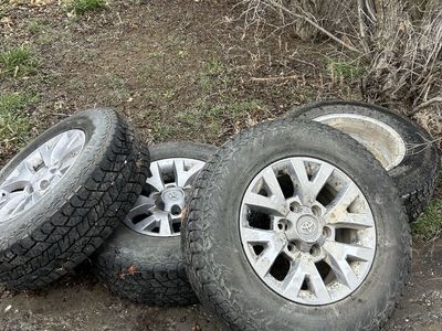 Toyota LT225/75R16 Rims and Tires with Lugs - Hardly Used