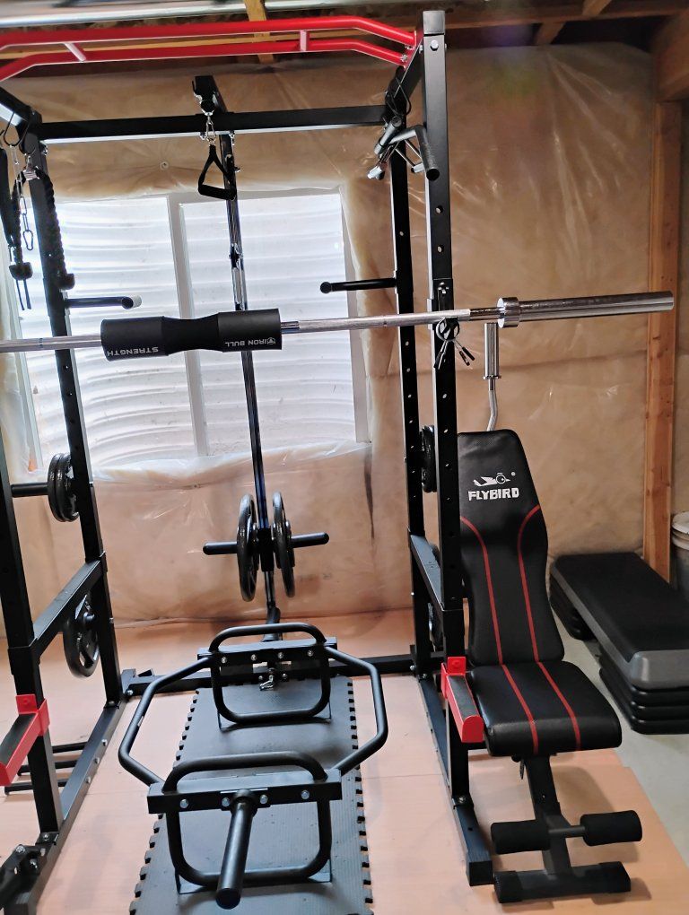 Squat rack + home gym equipment