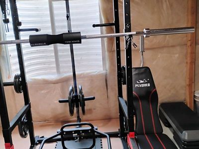 Squat rack + home gym equipment