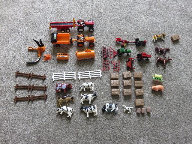 A LARGE SET OF TOY FARM TRACTORS, EQUIPMENT AND ANIMAL FIGURES!