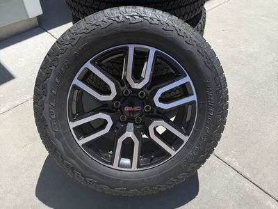 20 inch GMC factory wheels with Bridgestone Dueler tires