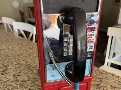 GTE 120 vintage pay phone red