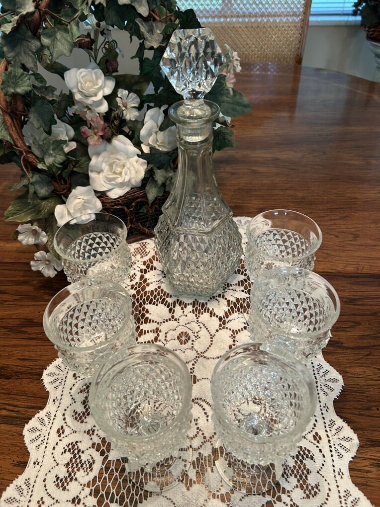 Crystal Decanter set with small stemmed glasses,