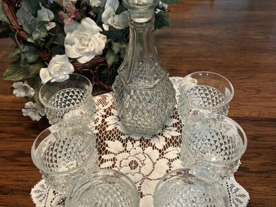 Crystal Decanter set with small stemmed glasses,