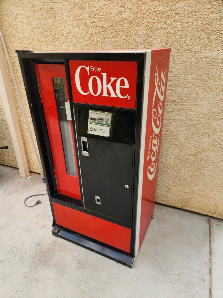 Vintage Coca-Cola vending machine, model USS-8-64