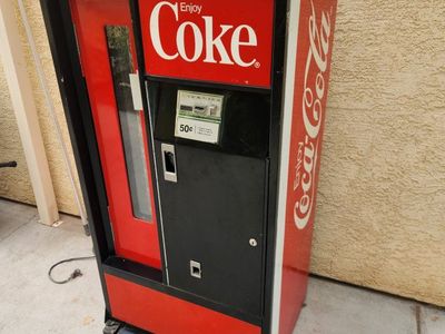 Vintage Coca-Cola vending machine, model USS-8-64