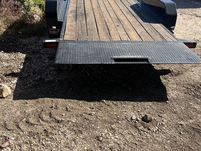 Heavy duty, tilt deck, equipment trainer