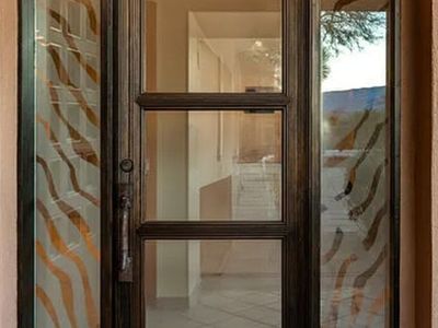 8 foot
Solid wood front door and door jam with sidelights