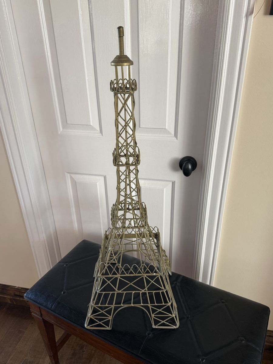 Tall Metal Eiffel Tower decoration 34” would be a cute trellis in the garden!