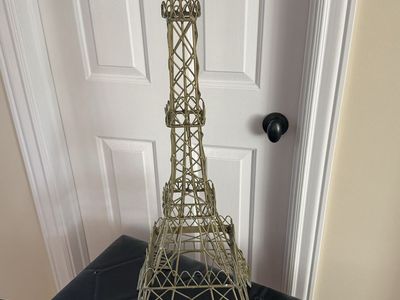 Tall Metal Eiffel Tower decoration 34” would be a cute trellis in the garden!