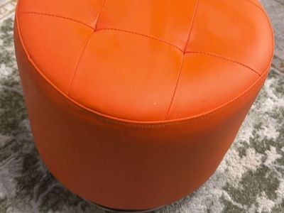 Modern swivel ottoman orange
