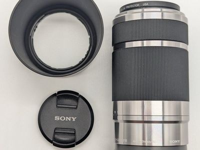 Sony E 55-210mm f/4.5-6.3 OSS E-Mount Lens SEL55210 Silver Excellent condition.