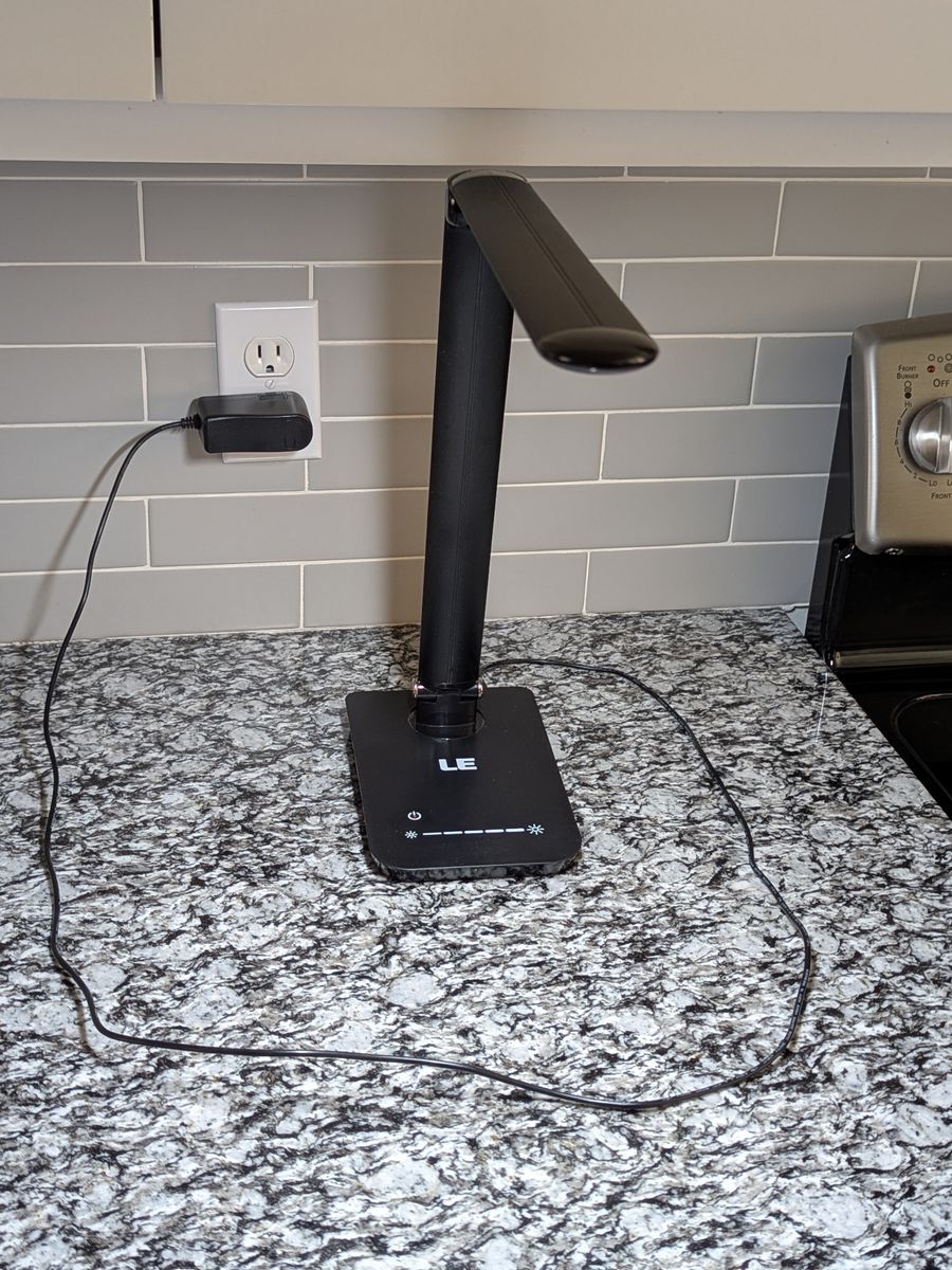 LED touch-sensitive desk lamp with seven brightness levels