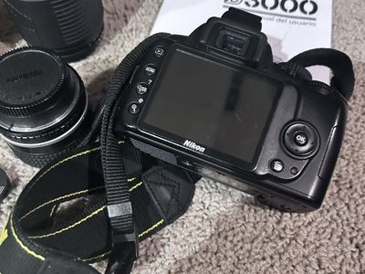 Nikon D3000 DSLR Camera Bundle with Lenses, Flash, Bag & Accessories