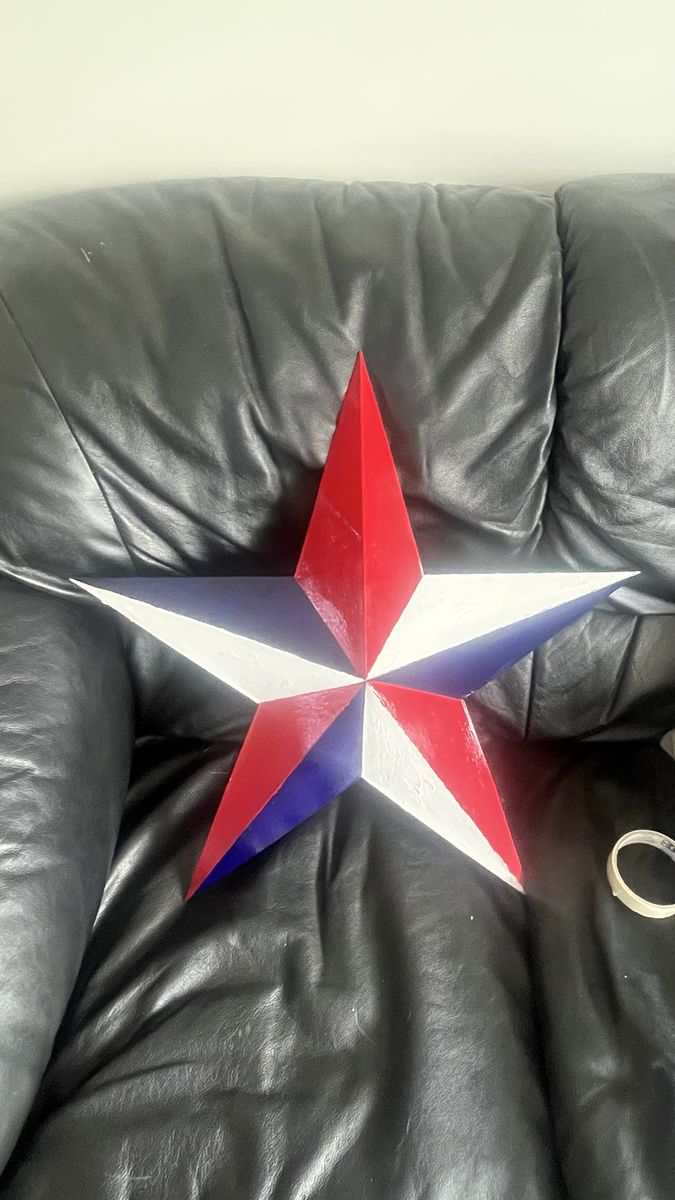 Mental star painted red, white and blue