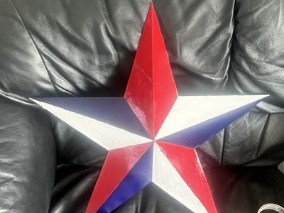 Mental star painted red, white and blue
