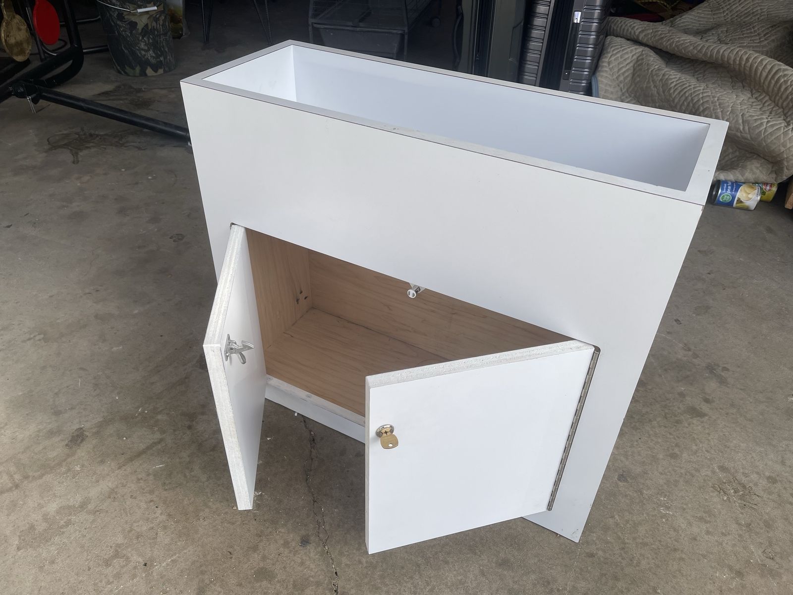 Very nice smaller cabinet with key and a spot on top to put your flower Oreo plant