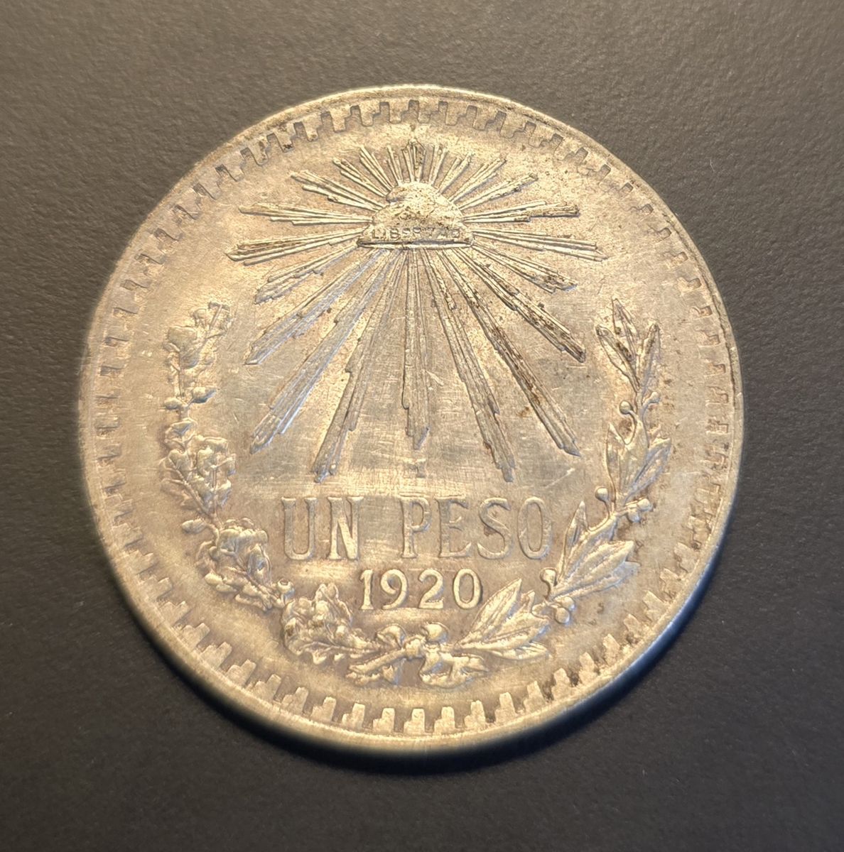 1920 Silver Un Peso Coin