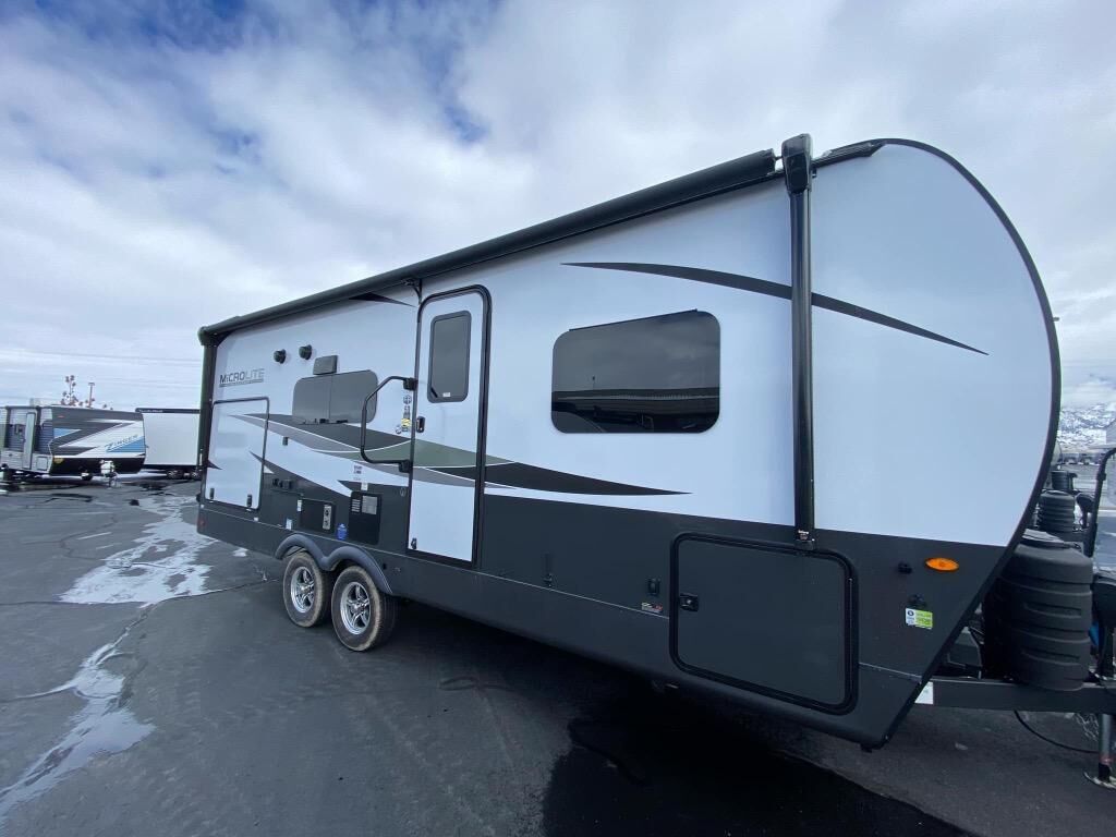 New 2025 Forest River RV Flagstaff Micro Lite Couples Travel Trailer w/Fireplace and 67" Theater Seats(25BSDS)