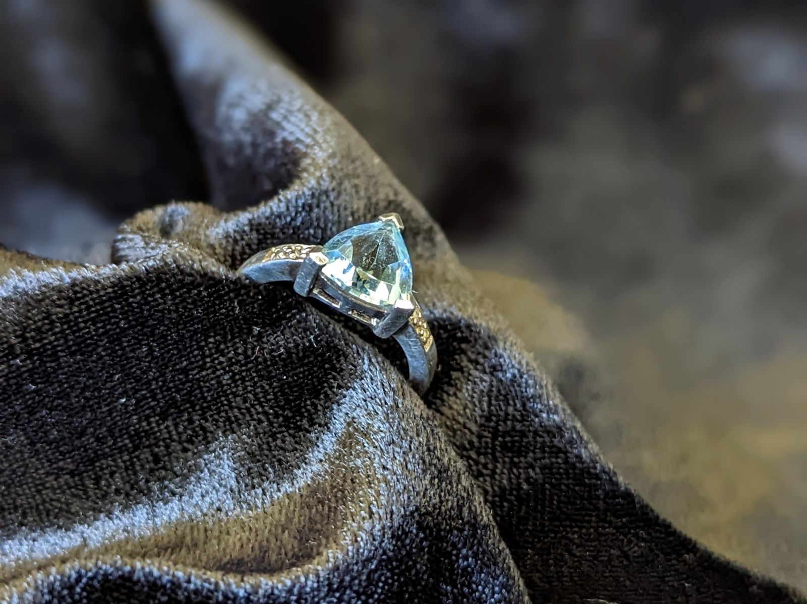 Blue topaz sterling silver ring with diamond accents