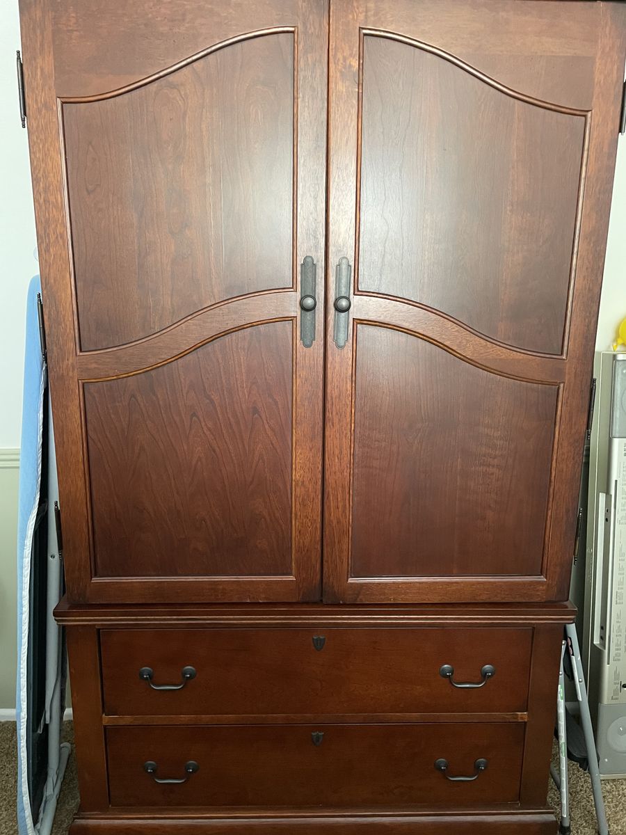 Dark Wood Armoire Wardrobe with 2 Drawers & Cabinet Storage (from Ashley furniture)