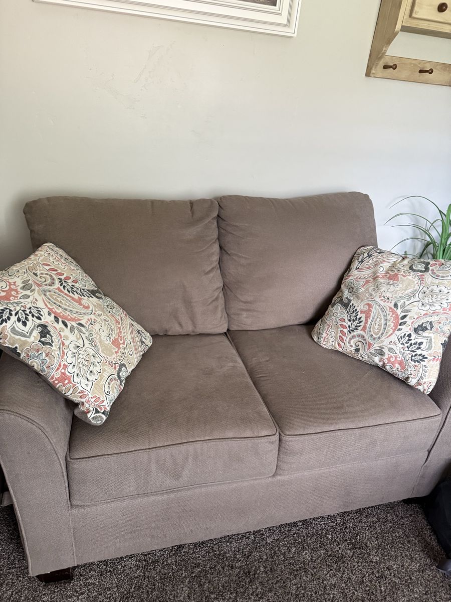 Loveseat with Patterned Throw Pillows