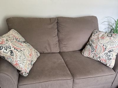 Loveseat with Patterned Throw Pillows