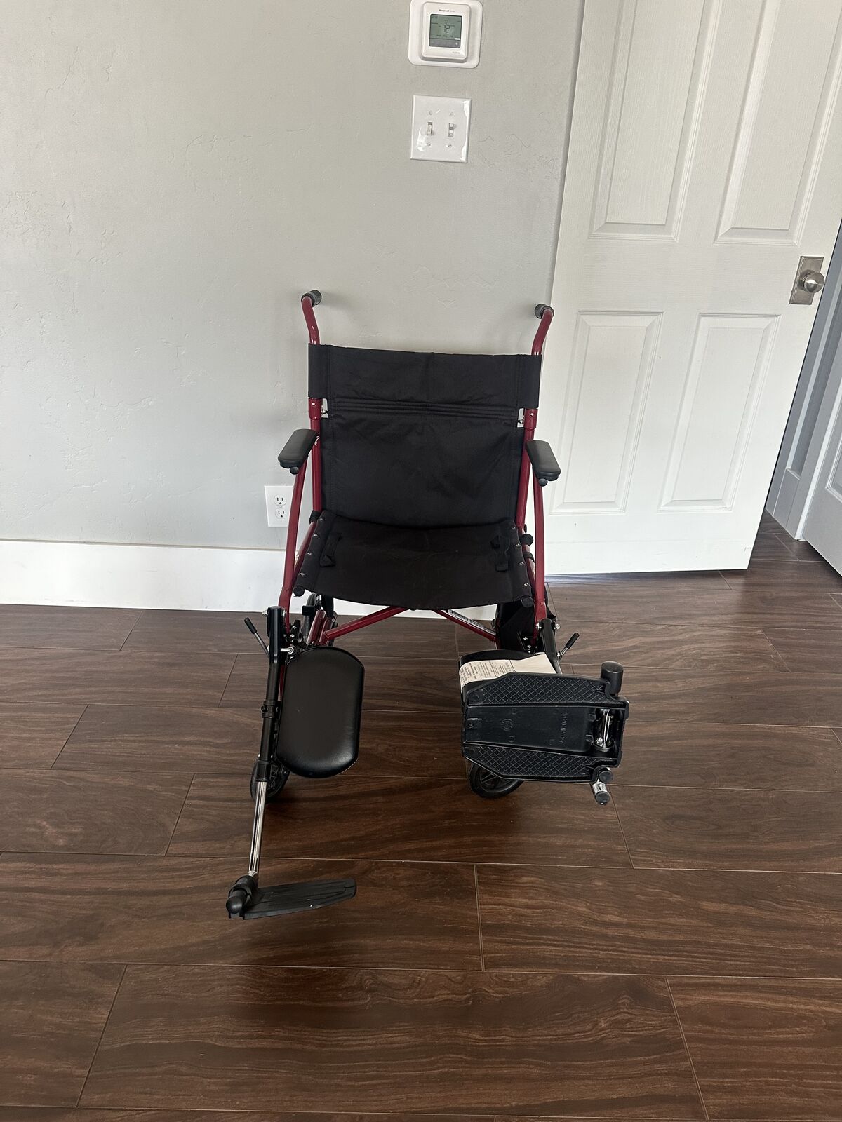 Wheelchair with adjustable legs