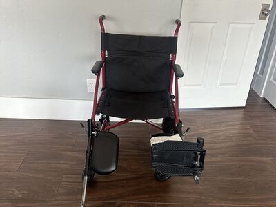 Wheelchair with adjustable legs