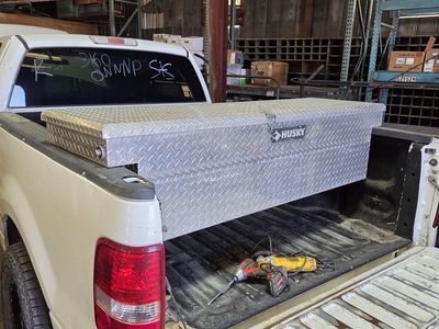 Truck bed tool box