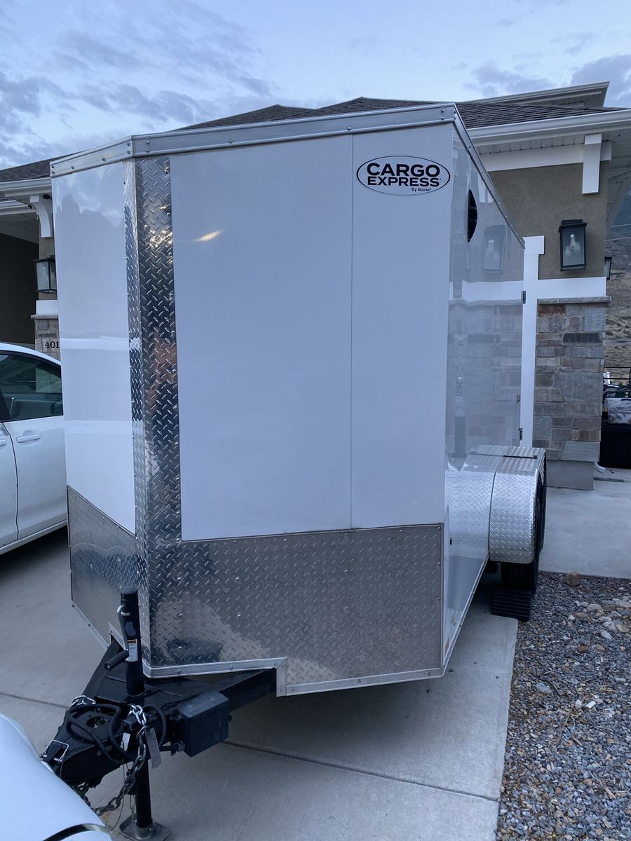 Cargo Express Enclosed Cargo Trailer 2024 - White, Double Axle 7000 GRVW Barn Doors 6-0” tall interior 6-6” clearance