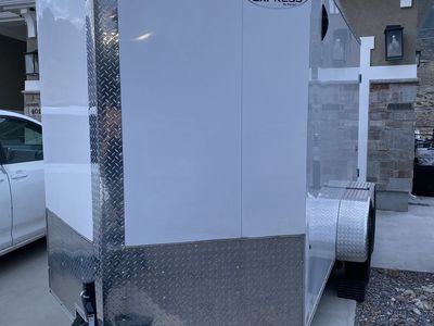 Cargo Express Enclosed Cargo Trailer 2024 - White, Double Axle 7000 GRVW Barn Doors 6-0” tall interior 6-6” clearance