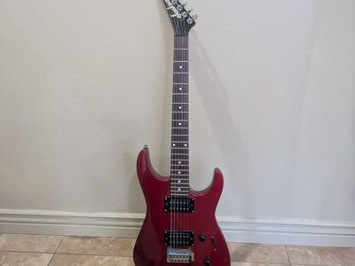 Jackson red guitar.