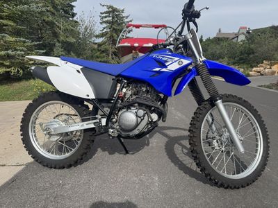 Off Road Motorcycles and Trailer - less than 15 hours of use each - nearly new condition