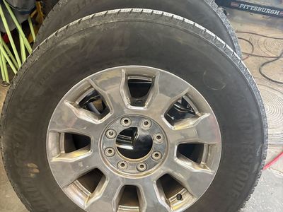 Set of 4 20” wheels and snow tires LT275/65R20