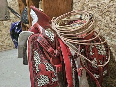 Red Leather Western Horse Saddle with Intricate Pattern & Rope - Used
