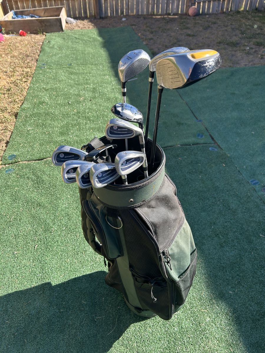 Set of right-handed mens golf clubs from Driver to putter, plus golf bag, golf balls and tees! Look!