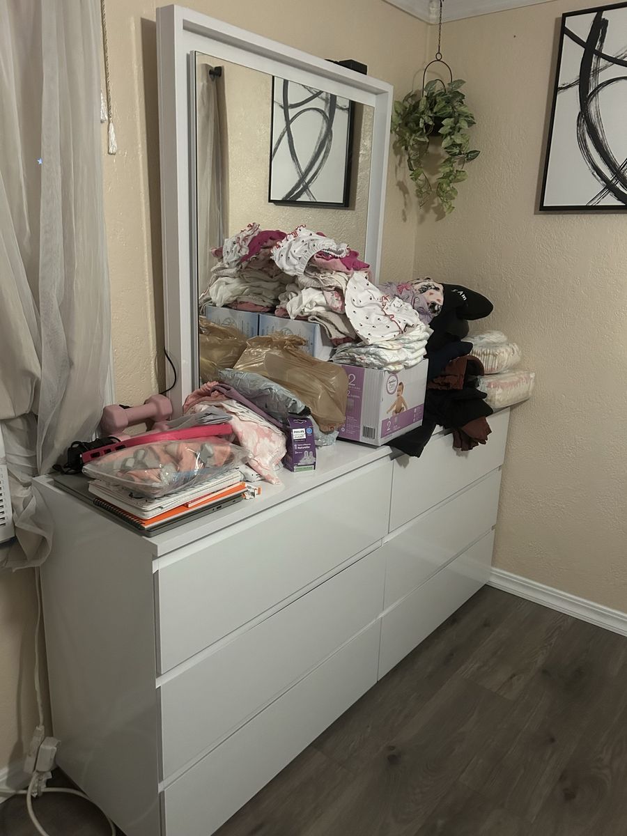 Modern White Dresser with Mirror and Black Upholstered Bed Frame