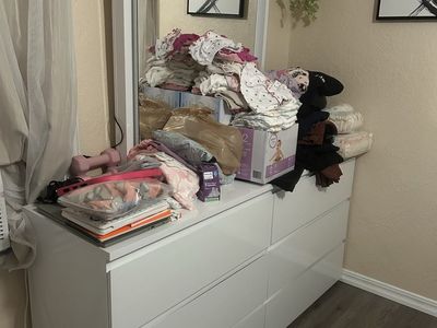 Modern White Dresser with Mirror and Black Upholstered Bed Frame