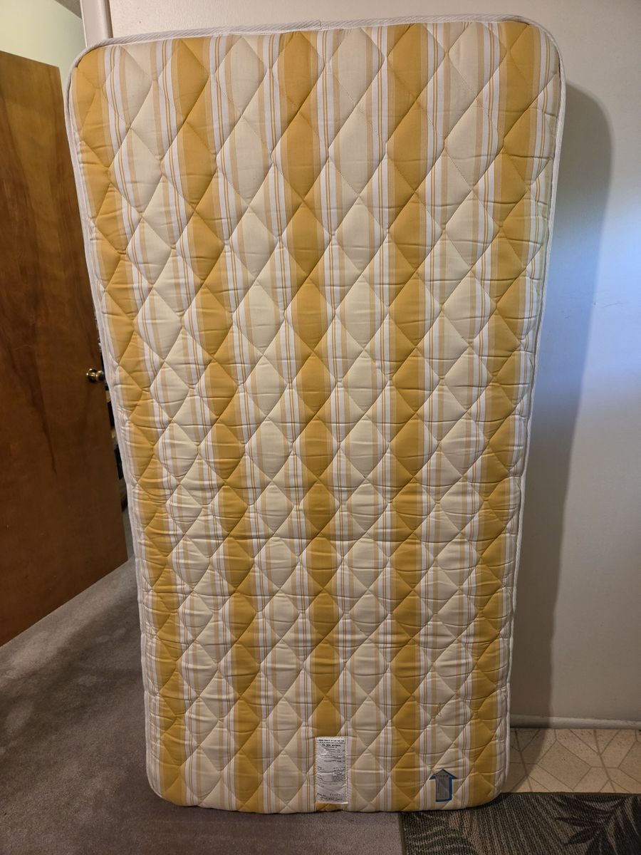 FREE - 2 twin mattresses (one metal bedframe included)